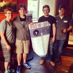 From left: Urban Growler's Jill Pavlak and head brewer Deb Loch stand next to Brew-Off hosts Derek Brown and head brewer Jeff Moriarty.