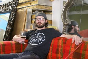 Forager head brewer Austin Jevne sips on a Flanders red he made.
